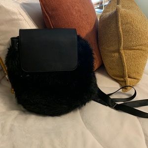 Faux fur back pack bag.